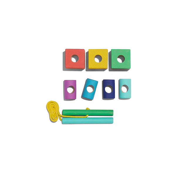 blocks with holes inside and threading rope with wooden sticks attached